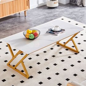 A coffee table made of rock slab material, with a smooth and natural surface that complements the modern design of the golden metal legs