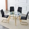 Table and chair set. Round dining table, glass tabletop with a diameter of 40 inches, and gold-plated metal legs